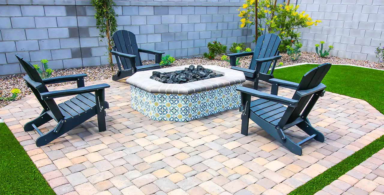 Paver patio fire pit seating area with Adirondack chairs